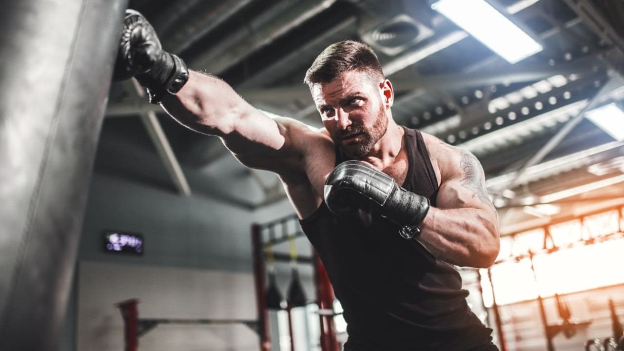 Member working the heavy bag
